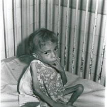 Young patient in crib at Santa Casa Hospital